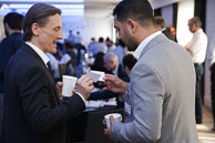 Exchanging business cards at conference