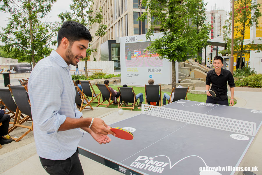 Office workers using the table tennis facilities in Ruskin Square during their lunch hour